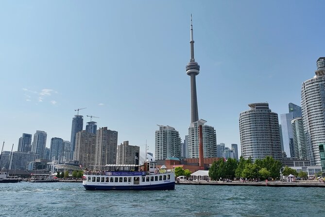 60-Minute Toronto Sightseeing Harbour Tour - The skyline sequence: CN Tower and Rogers Centre