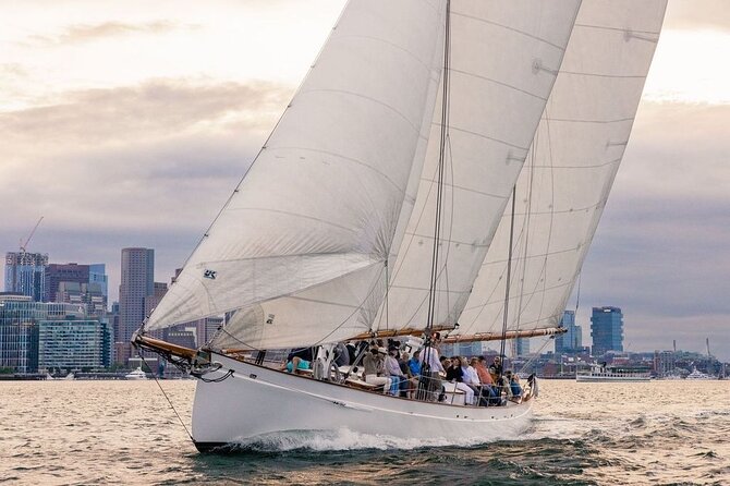 Boston Harbor Sunset Sail Tour - Sunset, city lights, and planes overhead