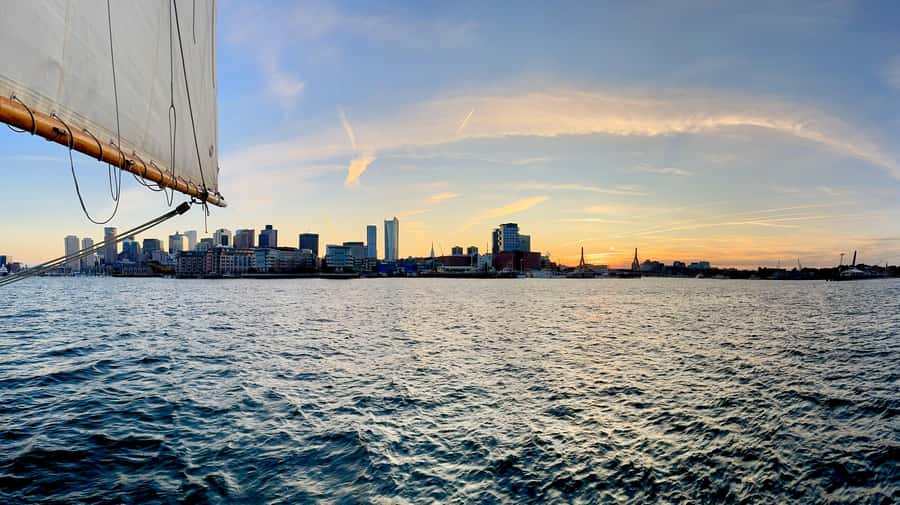 Boston: Sunset Tall Ship Harbor Cruise - Raising the sails gives the cruise its character