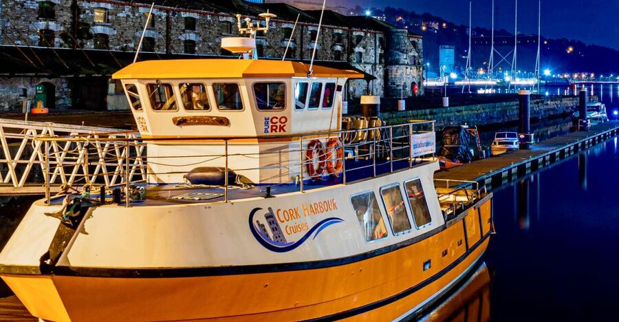 Cork: 2-Hour Guided Cork Harbour Scenic Cruise - Boarding the bright orange boat