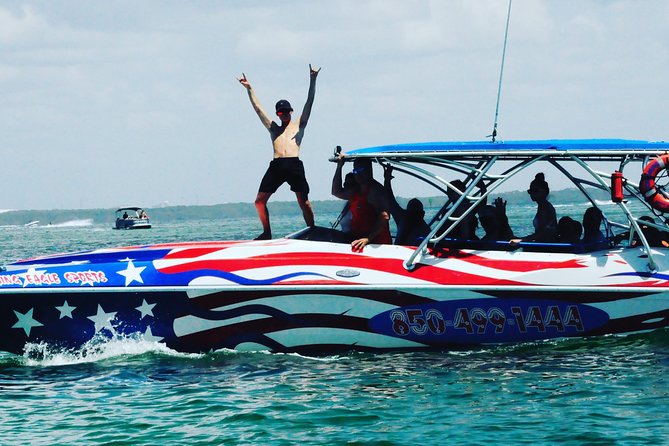 Dolphin-Watching Speedboat Cruise in Destin Harbor - Music, jokes, and the crew’s role