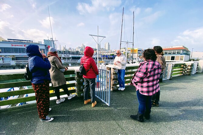 Fisherman’s Wharf Highlights Tour + Golden Gate Bay Voyage - Sea lions and the busy Pier 39 stretch
