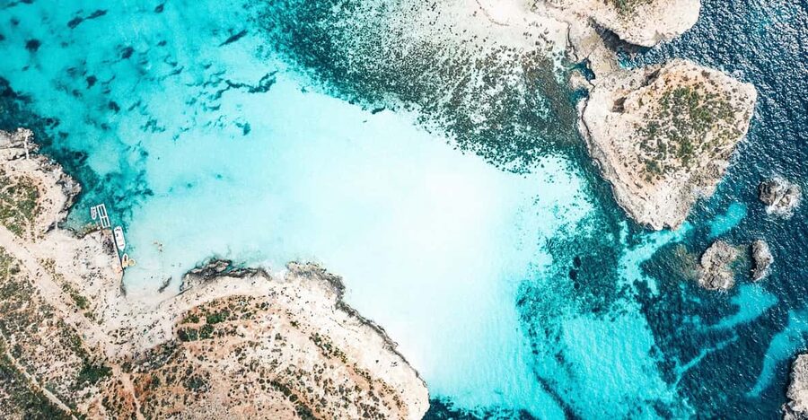 From Mellieha: Three Bay Cruise including the Blue Lagoon - Crystal Lagoon and its sea caves