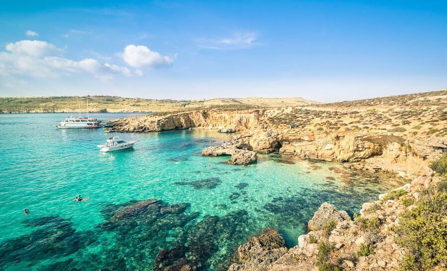 From Mellieha: Three Bay Cruise including the Blue Lagoon - The return past caves and Elephant Head