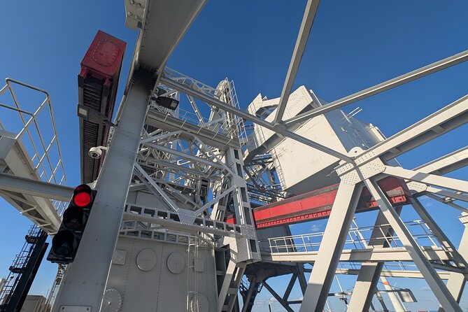 Guided Antwerp Port Tour, in your Car or Minibus - Havenhuis and the dry docks at Droogdokkenweg