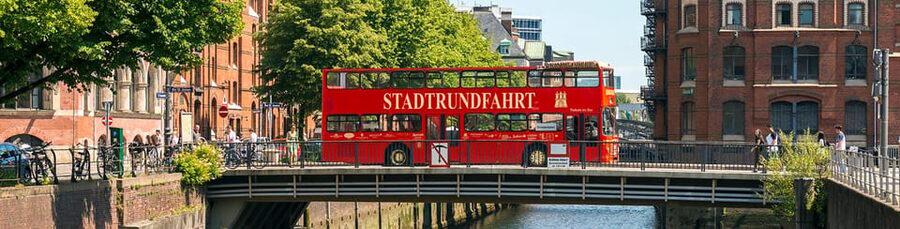 Hamburg: Harbor Cruise and Bus City Hop-On Hop-Off Tour - From old warehouses to modern container terminals