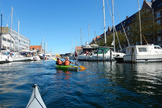 Kayak Tour in Copenhagen Harbor in May and September - Under the bridge and into the canal network