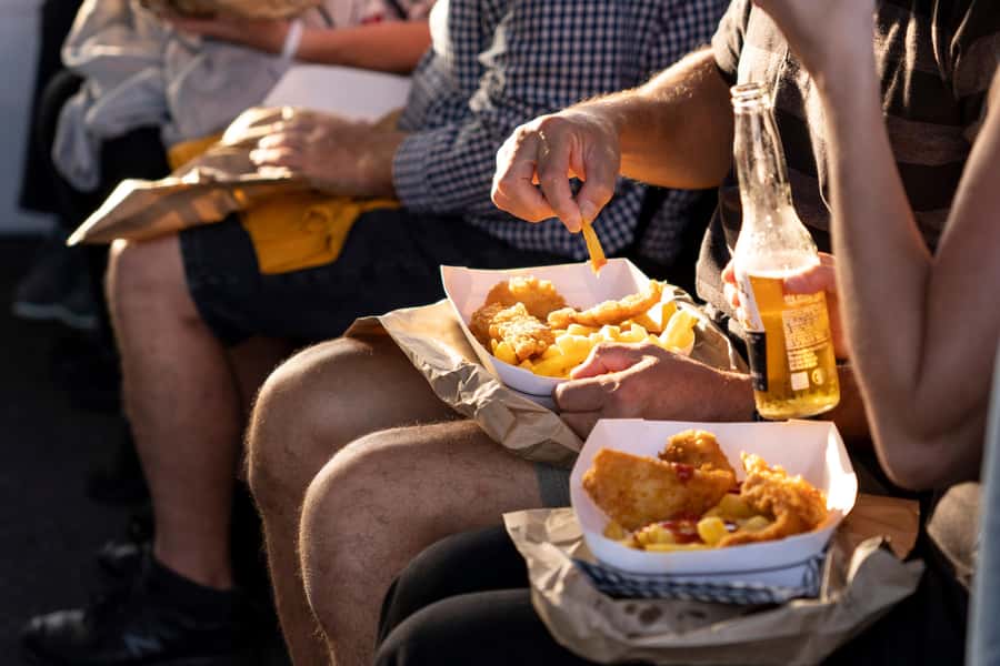 Raglan: Scenic Harbour Sunset Cruise - The boat, bar, and onboard mood
