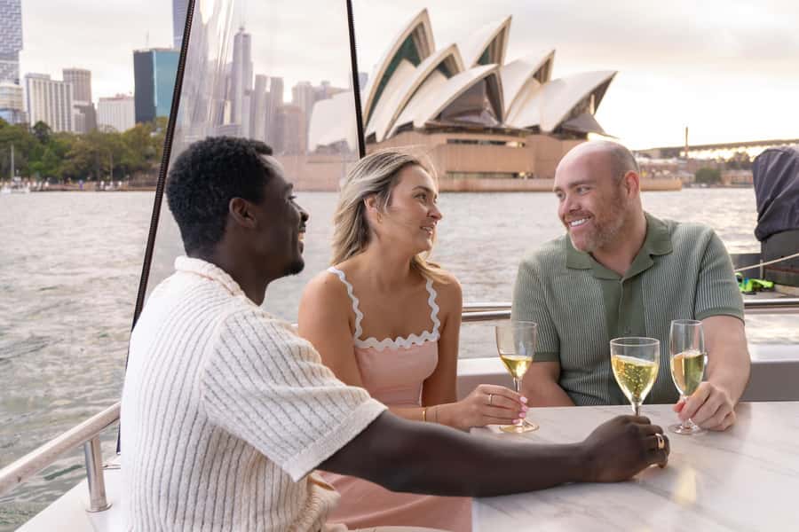Sydney: Golden Glow Sunset Harbour Cruise with 1 Drink - The best photo moments as the city lights up