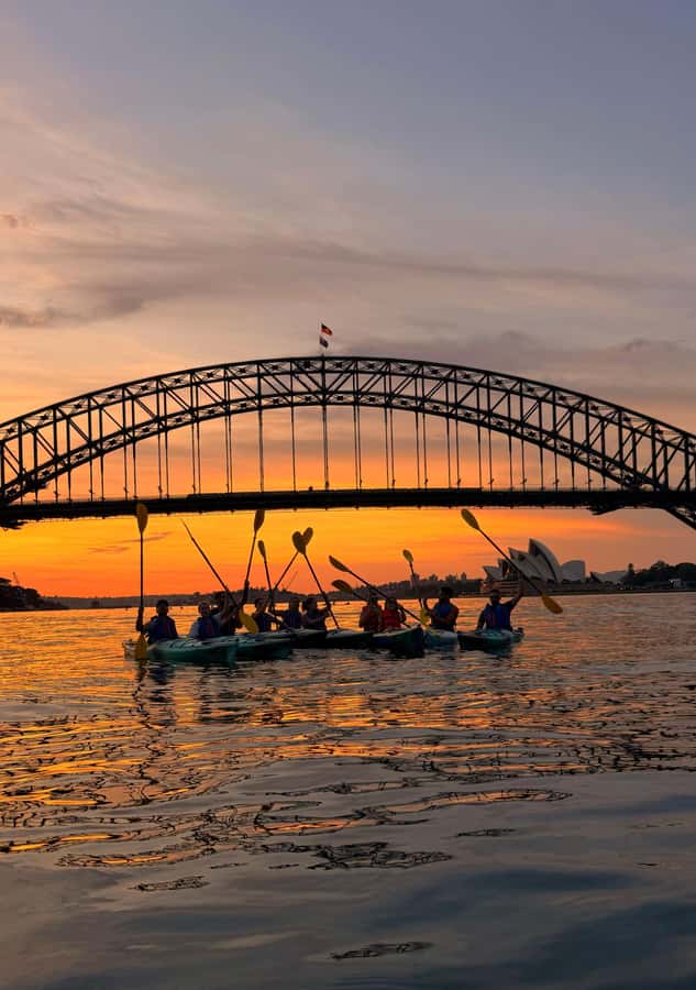 Sydney Sunrise Kayak Tour on Sydney Harbour - Under the Harbour Bridge at sunrise
