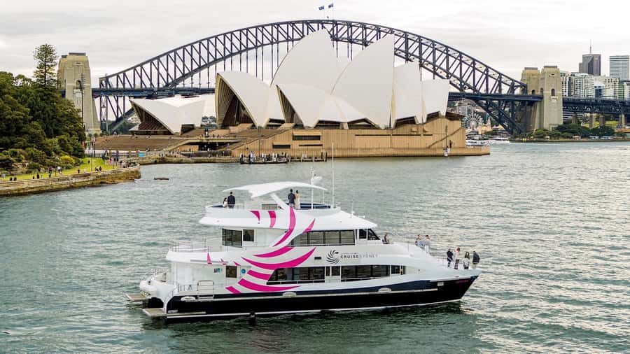 Sydney: Sydney Harbor Lunch Cruise with Welcome Drink - Moving from Darling Harbour toward the Harbour Bridge