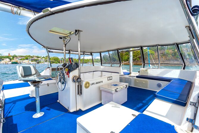 Vivid 90-Minute Sydney Harbour Catamaran Cruise with BYO Drinks - Luna Park and the return under the bridge
